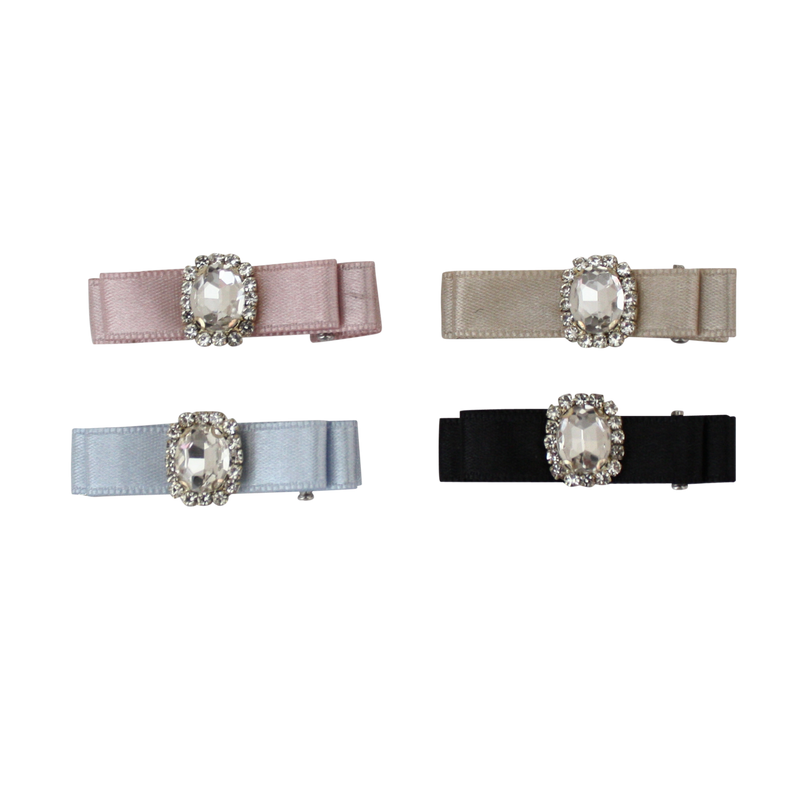 Satin hair clips with rhinestone jewel centers in pink, beige, blue, and black